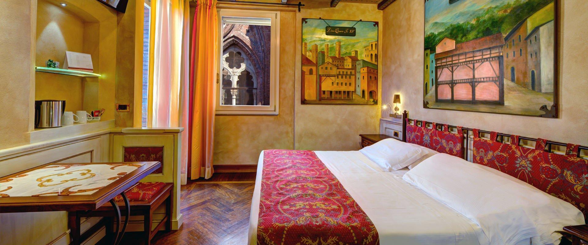 L’ALMA MATER E L’HOTEL COMMERCIANTI: DUE STORIE CHE S’INTRECCIANO  Art Hotel Commercianti Bologna L’ALMA MATER E L’HOTEL COMMERCIANTI: DUE STORIE CHE S’INTRECCIANO  Art Hotel Commercianti Bologna